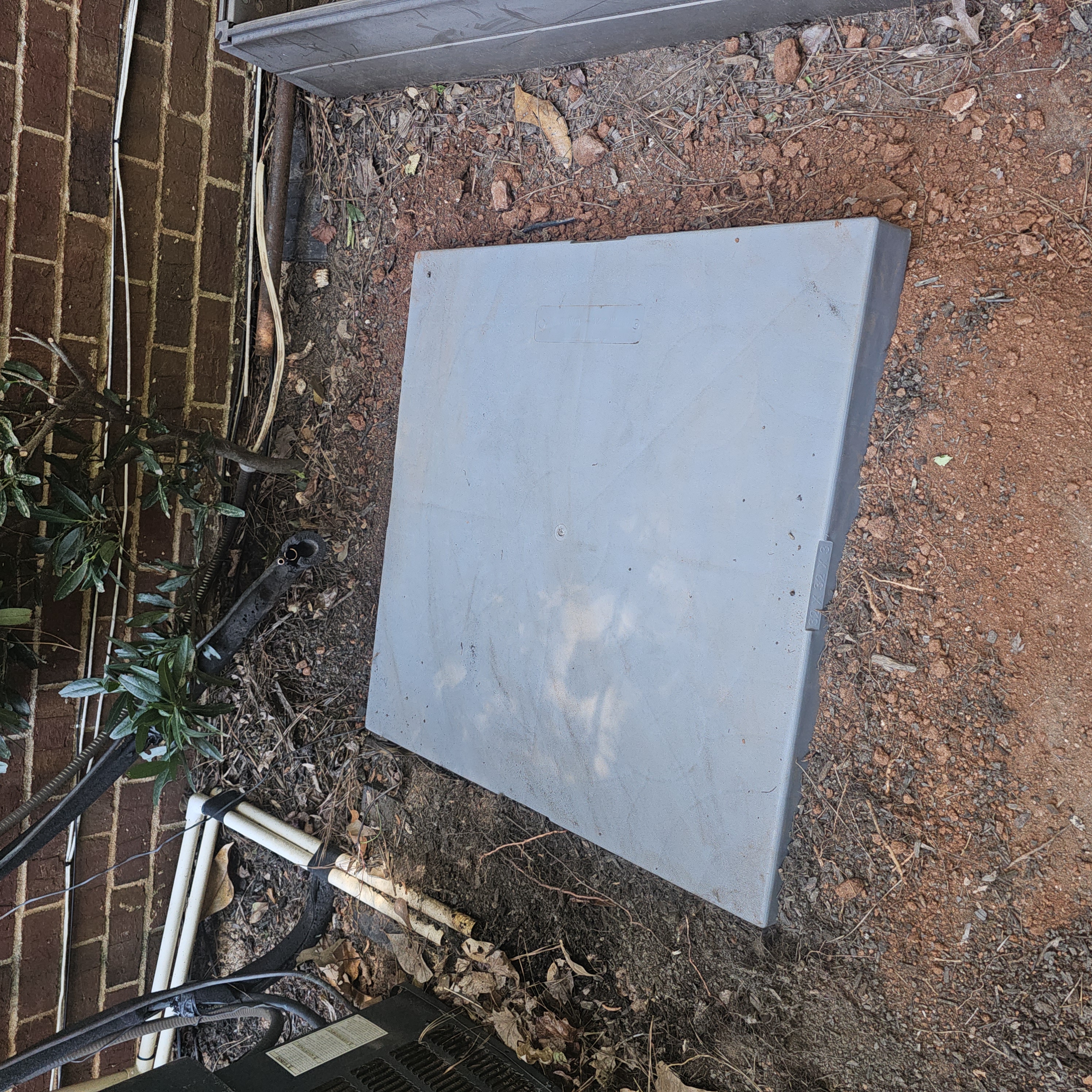 AC condenser pad installation